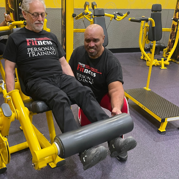 Frank Sealy training a client at a gym in Suffolk County, NY